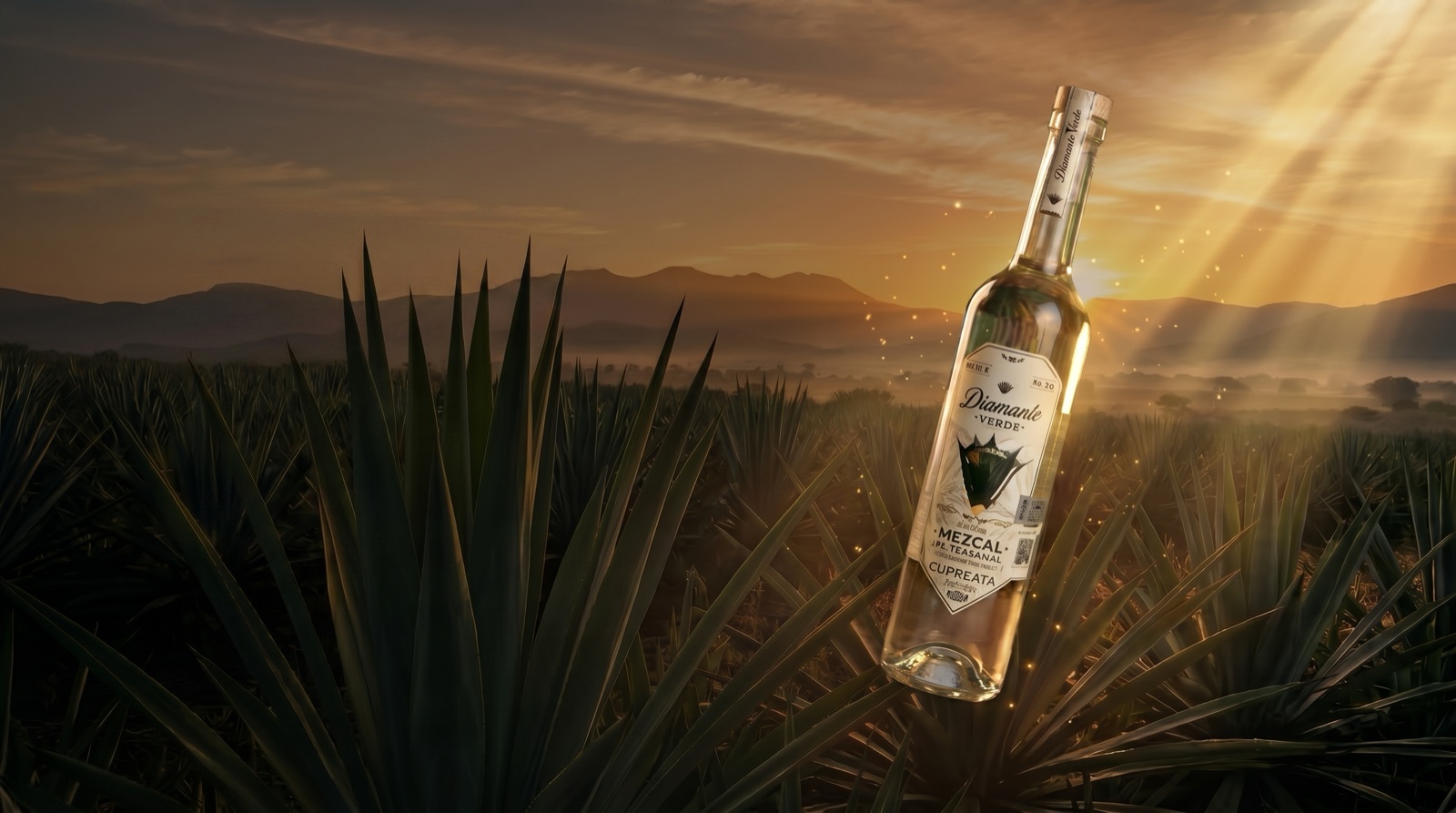 Diamante Verde Mezcal bottle in a wild Michoacán agave field at golden hour